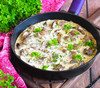 Печень куриная, тушенная в сливочном соусе